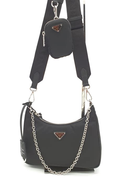 sac prada avec pochette|Prada bag with small pouch.